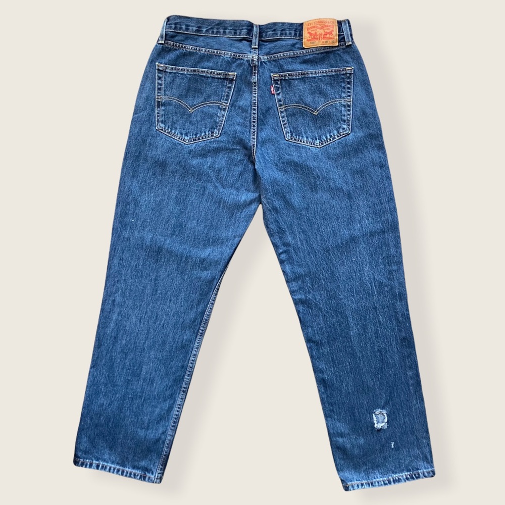 Thrashed Levi’s 550 Relaxed Blue Jeans